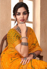 India Silk Yellow Chiffon Saree Features A Beautifully Attached Banarasi Border Combining The Softness And Flow Of Chiffon